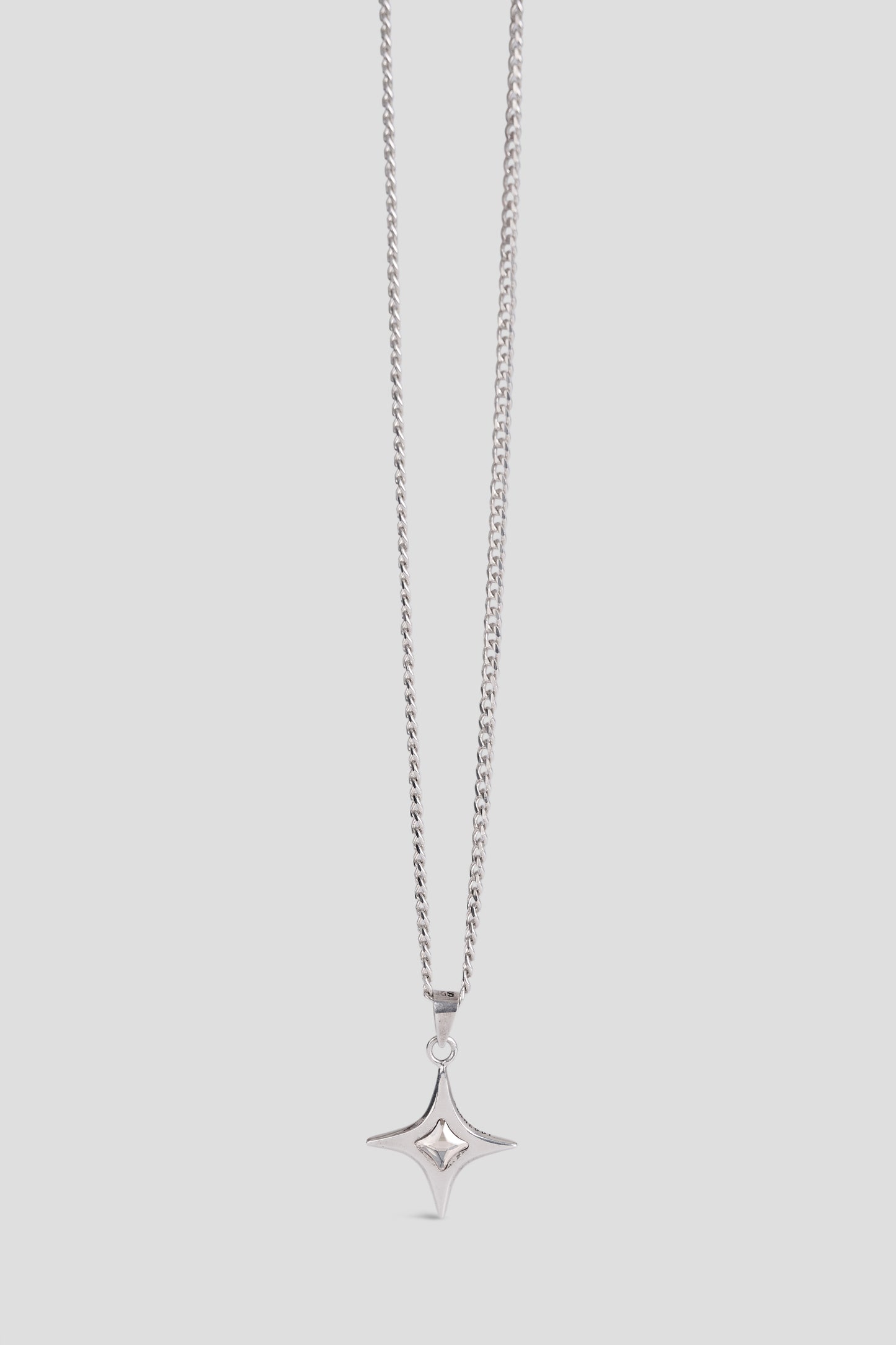 SPIKE STAR NECKLACE