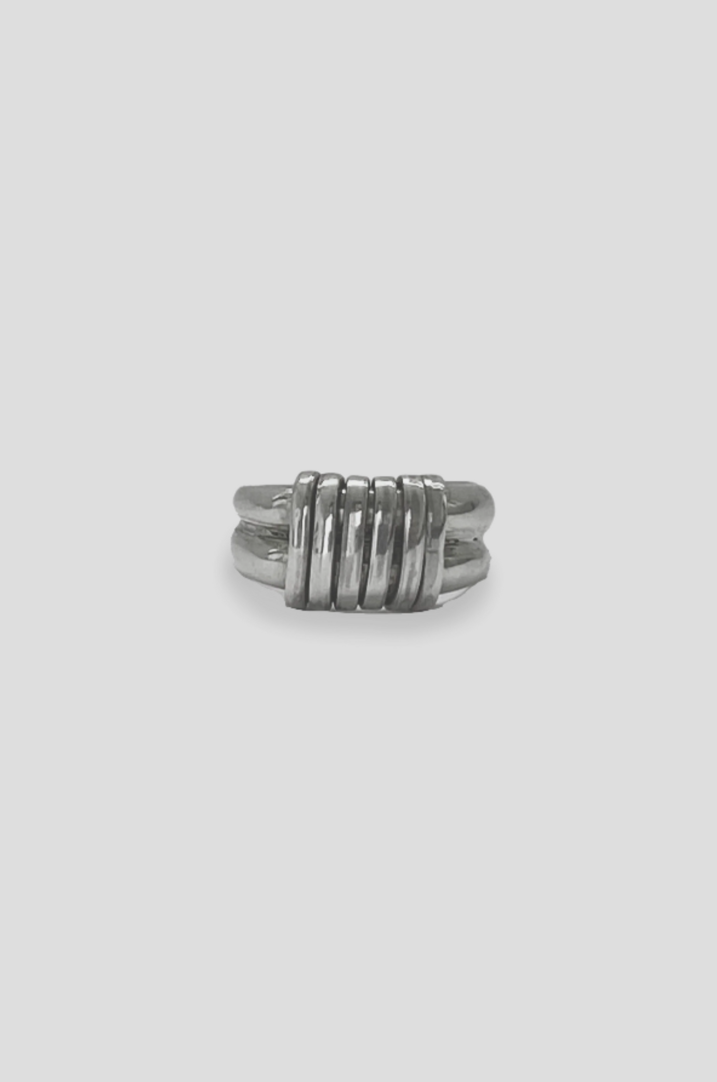CROSSED RING